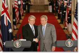 President George W. Bush and Australian Prime Minister Kevin Rudd shake hands at the conclusion of their joint press availability in the East Room of the White House Friday, March 28, 2008. White House photo by Joyce N. Boghosian