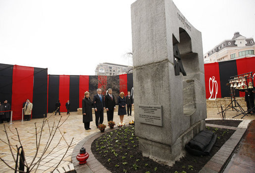 President George W. Bush and Mrs. Laura Bush, accompanied by President Victor Yushchenko and his wife Mrs. Kateryna Yushchenko, pay their respects at the Holodomor Memorial Tuesday, April 1, 2008, in Kyiv, Ukraine. The Holodomor Memorial is a remembrance to the victims 1932-1933 Ukrainian famine. White House photo by Eric Draper