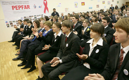 President George W. Bush and Mrs. Laura Bush applaud as they watch a skit sponsored by PEPFAR on HIV/AIDS performed by students at School 57 Tuesday, April 1, 2008, in Kyiv, Ukraine. White House photo by Shealah Craighead