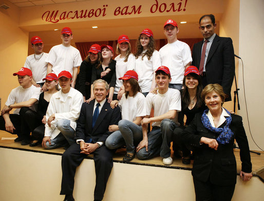 President George W. Bush and Mrs. Laura Bush pose with students from School 57 in Kyiv Tuesday, April 1, 2008, after the Ukrainian teens performed a skit sponsored by PEPFAR, the President's Emergency Plan for AIDS Relief. White House photo by Shealah Craighead