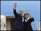 President George W. Bush and Mrs. Laura Bush wave upon their Romanian arrival Tuesday, April 1, 2008, at Henri Coanda International Airport in Bucharest, site of the 2008 NATO Summit. White House photo by Eric Draper