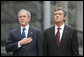 President George W. Bush stands with hand over heart during the playing of the national anthem Tuesday, April 1, 2008, during arrival ceremonies at the Presidential Secretariat in Kyiv. Standing with him is Ukrainian President Viktor Yushchenko. White House photo by Chris Greenberg