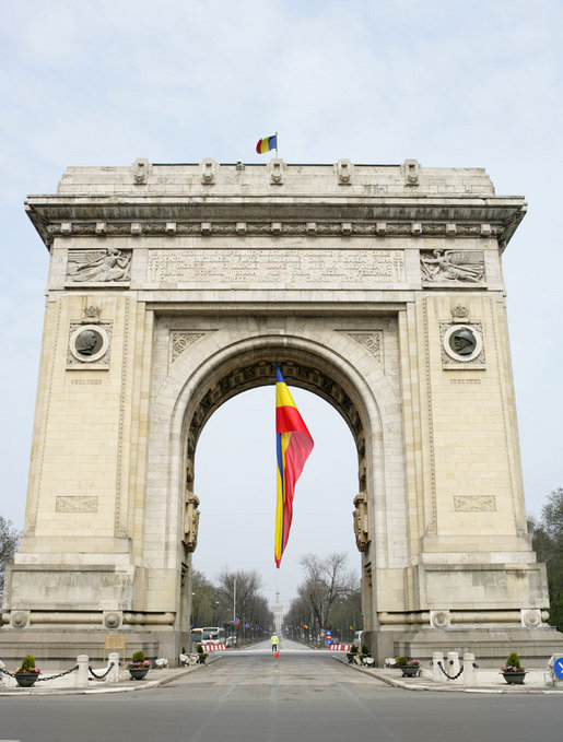 The Arcul de Triumf, designed by architect Petre Antonescu and located in north Bucharest, is 27 meters high and originally was built from wood after Romania gained its independence in 1878 so that victorious troops could march under it. Rebuilt and inaugurated in 1936, the current arch is a gateway to this year's 2008 NATO Summit. White House photo by Chris Greenberg