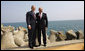 President George W. Bush and President Traian Basescu of Romania, pose for photographs Wednesday, April 2, 2008, on a seawall at the presidential retreat in Neptun, Romania. President Bush spent the day with his Romanian counterpart before the opening of the 2008 NATO Summit. White House photo by Eric Draper