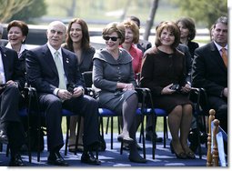 Mrs. Laura Bush and Mrs. Maria Basescu, spouse of Romania’s President Traian Basescu, break out in laughter at remarks made Wednesday, April 2, 2008, during a joint press availability with their husbands at the Protocol Villas Neptun-Olimp in Neptun, Romania. White House photo by Shealah Craighead