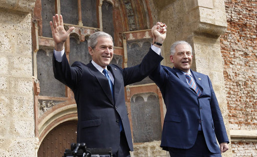 President George W. Bush and Prime Minister Ivo Sanader of Croatia, raise hands together before thousands who flocked to St. Mark's Square in downtown Zagreb Saturday, April 5, 2008, to see and hear the U.S. President. White House photo by Eric Draper