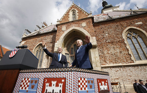 President George W. Bush and Prime Minister Ivo Sanader of Croatia, wave to the thousands who flocked to St. Mark's Square in downtown Zagreb Saturday, April 5, 2008, to see and hear the U.S. President. White House photo by Eric Draper