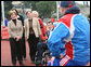Mrs. Laura Bush visits with members of the Russian Paralympic Team Sunday, April 6, 2008, during a visit to Central Sochi Stadium in Sochi, Russia. Standing with her is her interpreter, Marina Gross. White House photo by Shealah Craighead