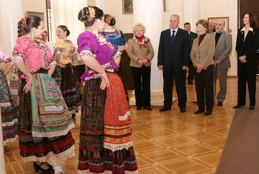 Mrs. Laura Bush stands with Sochi Mayor Viktor Kolodyazhny as they listen to the Russian singing group "Lubo," during a visit Sunday, April 6, 2008, to the Sochi Art Museum. With them at left is Mrs. Svetlana Ushakova, spouse of Yury Ushakov, Russian Ambassador to the United States. White House photo by Shealah Craighead