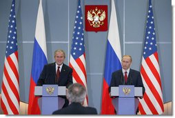 President George W. Bush and President Vladimir Putin smile as they respond to a reporter’s question Sunday, April 6, 2008, during a joint press availability in Sochi, Russia.  White House photo by Chris Greenberg