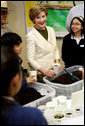 Mrs. Laura Bush joins students from the Williams Preparatory School in Dallas, Thursday, April 10, 2008, during a seed planting demonstration at the First Bloom program to help encourage youth to get involved with conserving America's National Parks. The First Bloom program is being introduced in five cities across the nation to give children a sense of pride in our natural resources and to be good stewarts of America's diverse environment. White House photo by Shealah Craighead