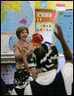 Mrs. Laura Bush participates in a class program with the first grade students of teacher Laura Gilbertson Monday, April 14, 2008, at the Martin Luther King Elementary School in Washington, D.C., to mark the tenth anniversary of Teach for America Week. White House photo by Shealah Craighead