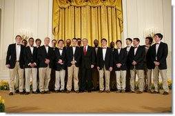President George W. Bush thanks the Virginia Gentlemen, an a cappella vocal ensemble of the University of Virginia, following their performance Monday evening, April 14, 2008 in the East Room of the White House, during a reception in honor of the 265th birthday of former President Thomas Jefferson.  White House photo by Chris Greenberg