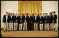President George W. Bush thanks the Virginia Gentlemen, an a cappella vocal ensemble of the University of Virginia, following their performance Monday evening, April 14, 2008 in the East Room of the White House, during a reception in honor of the 265th birthday of former President Thomas Jefferson. White House photo by Chris Greenberg