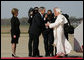 President George W. Bush and Laura Bush greet Pope Benedict XVI on his arrival to Andrews Air Force Base, Md., Tuesday, April 15, 2008, the first stop of a six-day visit to the United States. White House photo by Shealah Craighead