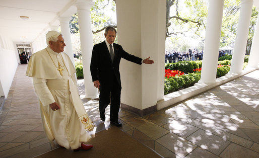 President George W. Bush escorts Pope Benedict XVI along the White House Colonnade for their meeting in the Oval Office Wednesday, April 16, 2008, following the Pope's welcoming ceremony on the South Lawn of the White House. White House photo by Eric Draper