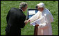 President George W. Bush shakes hands with Pope Benedict XVI following the Pope’s remarks Wednesday, April 16, 2008, at the welcoming ceremony for the Pope on the South Lawn of the White House. White House photo by Joyce N. Boghosian