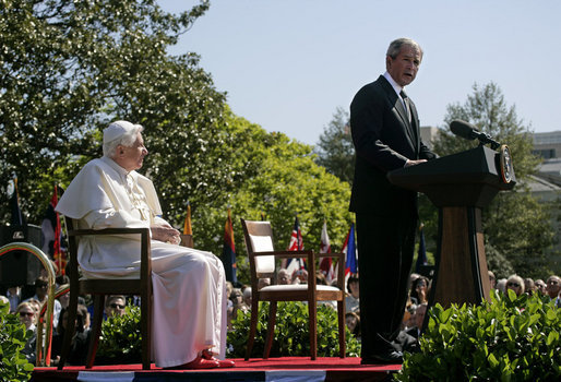 President George W. Bush delivers remarks Wednesday, April 16, 2008, during the arrival ceremony for Pope Benedict XVI on the South Lawn of the White House. Said the President, "Holy Father, thank you for making this journey to America. Our nation welcomes you. We appreciate the example you set for the world, and we ask that you always keep us in your prayers." White House photo by David Bohrer