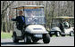 President George W. Bush waves as South Korean President Lee Myung-bak drives their golf cart, followed by Laura Bush and South Korea first lady Kim Yoon-ok in theirs Friday, April 18, 2008, at the Presidential retreat at Camp David, Md. White House photo by Shealah Craighead