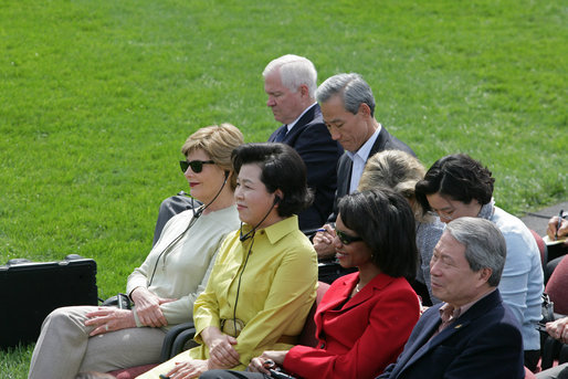 Mrs. Laura Bush joined by Mrs. Kim Yoon-ok, wife of the South Korean President Lee Myung-bak, U.S. Secretary of State Condoleezza Rice, and U.S. Defense Secretary Robert Gates listen during a joint press availability with President George W. Bush and South Korean President Lee Myung-bak Saturday, April 19, 2008, at the Presidential retreat at Camp David, Md. White House photo by Joyce N. Boghosian