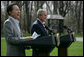 South Korean President Lee Myung-bak laughs as President George W. Bush speaks of President Lee's nickname the "Bulldozer" during a joint press availability Saturday, April 19, 2008, at the Presidential retreat at Camp David, Md. During his remarks, President Bush said, "President Lee is the first Korean President to visit Camp David. And I don't know if the American citizens understand your nickname -- you're known as the "Bulldozer." He said to make sure that it was a bulldozer with a computer. And the reason why is this is a man who takes on big challenges and he doesn't let obstacles get in the way. I like his spirit, I like his candor, and I like his optimistic vision. But most of all I really appreciate his values." White House photo by Shealah Craighead