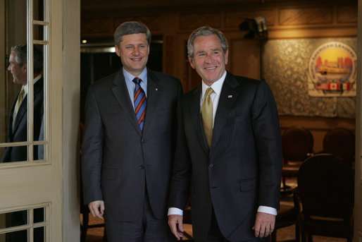 President George W. Bush and Canadian Prime Minister Stephen Harper arrive for their first meeting of the 2008 North American Leaders' Summit Monday, April 21, 2008, at the Windsor Court Hotel in New Orleans. White House photo by Joyce N. Boghosian
