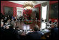 President George W. Bush, right, participates in a trilateral meeting Tuesday, April 22, 2008 in New Orleans, with Mexico's President Felipe Calderon and Canada's Prime Minster Stephen Harper and their delegations at the 2008 North American Leaders' Summit. White House photo by Joyce N. Boghosian