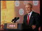 President George W. Bush smiles in response to a reporter's question at a joint news conference Tuesday, April 22, 2008, with Mexico's President Felipe Calderon and Canada�s Prime Minster Stephen Harper on the last day of the 2008 North American Leaders' Summit in New Orleans. White House photo by Chris Greenberg