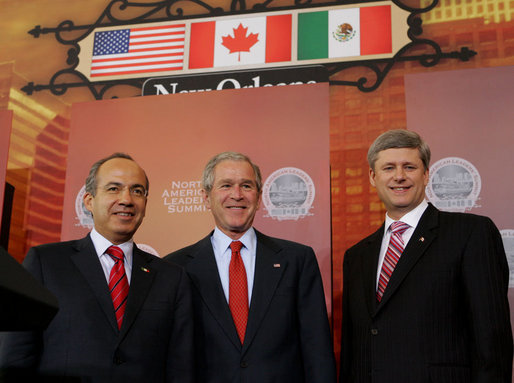 President George W. Bush, Mexico's President Felipe Calderon and Canadian Prime Minster Stephen Harper stand together at the conclusion of their joint news conference Tuesday, April 22, 2008, the last day of the 2008 North American Leaders' Summit in New Orleans. White House photo by Joyce N. Boghosian