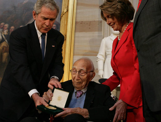 President George W. Bush presents the Congressional Gold Medal to famed heart surgeon Dr. Michael Ellis DeBakey during a ceremony Wednesday, April 23, 2008, at the U.S. Capitol. Said the President, "For nearly a hundred years, our country has been blessed with the endless talents and dedication of Dr. Michael DeBakey. And he has dedicated his career to a truly noble ambition -- bettering the life of his fellow man." White House photo by Chris Greenberg