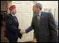 President George W. Bush shakes the hand of Marty Conatser, the National Commander of the American Legion during a courtesy visit Monday, April 28, 2008, to the Oval Office. The National Commander is the organization's highest position, elected annually at the American Legion's summer convention. White House photo by Chris Greenberg