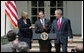 Mike Geisen, the 2008 National Teacher of the Year, is flanked by President George W. Bush and Secretary of Education Margaret Spellings as they welcome him to the Rose Garden Wednesday, April 30, 2008. The 35-year-old, 7th-grade teacher from Crook County Middle School in Prineville, Ore., was chosen from 56 nominees, including the four U.S. territories, the District of Columbia and the Department of Defense Education Activity. White House photo by Shealah Craighead
