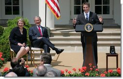 President George W. Bush and Secretary Margaret Spellings of the Department of Education, laugh as they listen to remarks by Mike Geisen, the 2008 National Teacher of the Year. Said the 35-year-old, 7th-grade science teacher from Prineville, Ore., "Each of the teachers that sits here today amongst us is here today because of their commitment and their courage to live in light of this fact: Children are fully human beings. Children are fully human beings. They're not conglomerations of hormones, they're not animals to be trained, they're not just numbers to be measured or future commodities to produce. They are our equals. They're the here and the now. And they are beautiful."  White House photo by Shealah Craighead