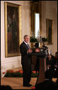 President George W. Bush delivers remarks during the Celebration of Asian Pacific American Heritage Month Thursday, May 1, 2008, in the East Room of the White House. "More than 15 million Americans claim Asian or Pacific ancestry. They make America's culture more vibrant, and we're a better place and a more lively place," President Bush stated during his remarks. White House photo by Grant Miller