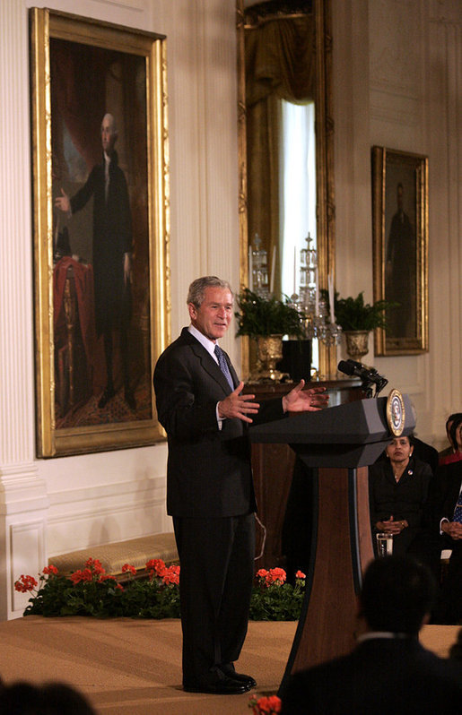 President George W. Bush delivers remarks during the Celebration of Asian Pacific American Heritage Month Thursday, May 1, 2008, in the East Room of the White House. "More than 15 million Americans claim Asian or Pacific ancestry. They make America's culture more vibrant, and we're a better place and a more lively place," President Bush stated during his remarks. White House photo by Grant Miller