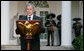 President George W. Bush welcomes guests to the Rose Garden Monday evening, May 5, 2008, for a social dinner in honor of Cinco de Mayo. White House photo by Chris Greenberg