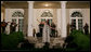 Singer Shaila Durcal and the Mariachi Campanas de America entertain President George W. Bush, Laura Bush, and their guests in the Rose Garden Monday evening, May 5, 2008, during a social dinner at the White House in honor of Cinco de Mayo. White House photo by Chris Greenberg