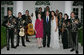 President George W. Bush and Laura Bush pose for photos with singer Shaila Durcal, Dorio Ferreira Sanchez and the Mariachi Campanas de America following their performance in the Rose Garden Monday evening, May 5, 2008, during a social dinner at the White House in honor of Cinco de Mayo. White House photo by Chris Greenberg