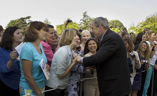 President George W. Bush greets guests at the conclusion of the Military Spouse Day celebration Tuesday, May 6, 2008, at the White House. Begun in 1984, the day was established to acknowledge the profound impact military spouses have on service members and to honor their volunteer service in educational, social and community endeavors. White House photo by Joyce N. Boghosian
