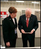 Vice President Dick Cheney examines an economic stimulus check Thursday, May 8, 2008, while on a tour of the Philadelphia Regional Financial Center with Director Betty Belinsky in Philadelphia. From May through July the Philadelphia Regional Financial Center will print over 42 million checks for disbursement to U.S. citizens as part of the Economic Stimulus Act of 2008. White House photo by David Bohrer