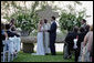 Henry Hager and Jenna Bush exchange vows at the altar Saturday, May 10, 2008, during their wedding ceremony at Prairie Chapel Ranch near Crawford, Texas. Presiding over the ceremony is the Rev. Kirbyjon Caldwell of Houston's Windsor Village United Methodist Church. White House photo by Shealah Craighead
