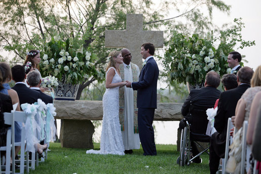 Henry Hager and Jenna Bush exchange vows at the altar Saturday, May 10, 2008, during their wedding ceremony at Prairie Chapel Ranch near Crawford, Texas. Presiding over the ceremony is the Rev. Kirbyjon Caldwell of Houston's Windsor Village United Methodist Church. White House photo by Shealah Craighead