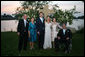 President George W. Bush and Mrs. Laura Bush and Mr. and Mrs. John Hager pose with the newly married couple, Jenna and Henry Hager, in front of the altar Saturday, May 10, 2008, after their wedding ceremony at Prairie Chapel Ranch near Crawford, Texas. White House photo by Shealah Craighead