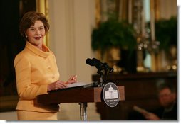 Mrs. Laura Bush welcomes guests to the East Room of the White House Monday, May 12, 2008, as she congratulates the recipients of the 2008 Preserve America Presidential Awards. The African Burial Ground Project, The Corinth and Alcorn County Mississippi Heritage Tourism Initiative, the Lower East Side Tenement Museum and the Texas Historic Courthouse Preservation Program were all honored for their efforts in preserving our national historic sites. White House photo by Allison Huff