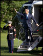 President George W. Bush waves from the steps of Marine One Tuesday, May 13, 2008 on the South Lawn of White House, as he departs on a five-day trip to Israel, Saudi Arabia and Egypt. White House photo by Eric Draper