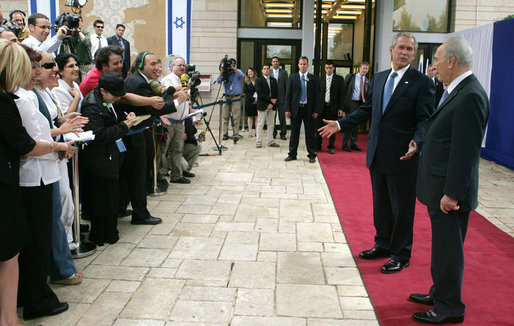 President George W. Bush and President Shimon Peres of Israel talk to members media following their meeting Wednesday, May 14, 2008, at President Peres' Jerusalem residence. White House photo by Joyce N. Boghosian