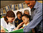 Mrs. Laura Bush looks on during an examination of 1-year-old Orie Holkan during a visit Wednesday, May 14, 2008, to the Tipat Chalav-Gonenim Neighborhood Mother and Child Care Center in Jerusalem. With them are Ms. Sarit Fuast, the nurse, and Talala Holkan, the young child’s father. White House photo by Shealah Craighead