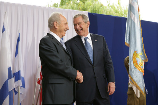 President George W. Bush and President Shimon Peres of Israel shake hands after their meeting Wednesday, May 14, 2008, in Jerusalem. White House photo by Chris Greenberg