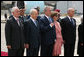 President George W. Bush and Mrs. Laura Bush are joined by Israel’s Ambassador Yitzhak Eldan, left, President Shimon Peres, and Prime Minister Ehud Olmert during the playing of the national anthems Wednesday, May 14, 2008, during arrival ceremonies in honor of President and Mrs. Bush at Ben Gurion International Airport in Tel Aviv. White House photo by Joyce N. Boghosian
