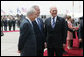 President George W. Bush shares a smile with Israel’s President Shimon Peres, left, and Prime Minister Ehud Olmert, as arrival ceremonies wind down Wednesday, May 14, 2008, at Ben Gurion International Airport for the U.S. leader and Mrs. Laura Bush. White House photo by Joyce N. Boghosian